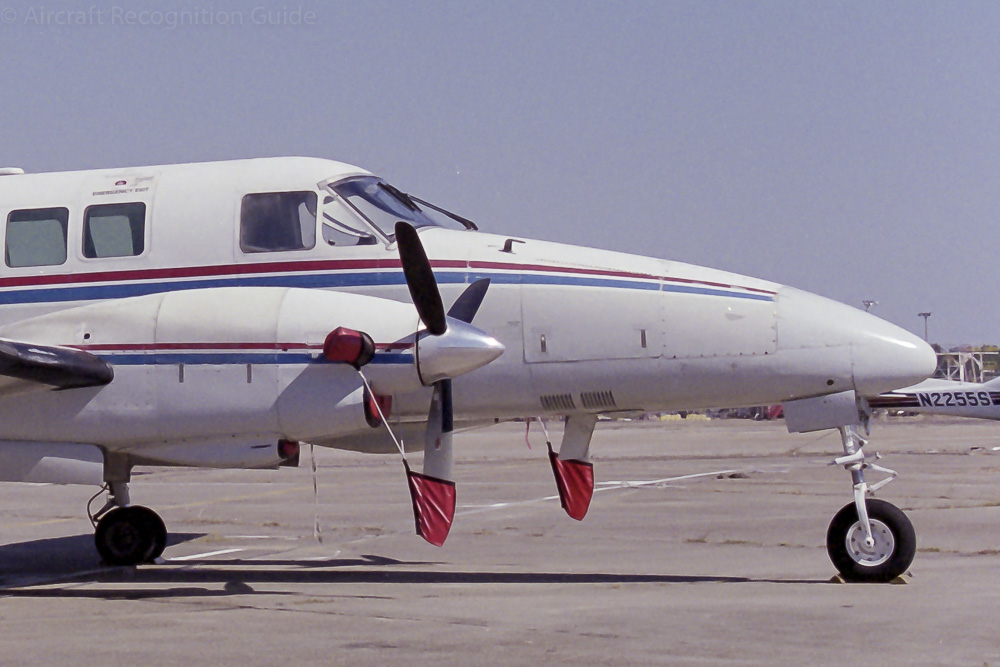 At the end of the long nose of the Beech 99 is the single wheel nose gear that retracts rearward. Image