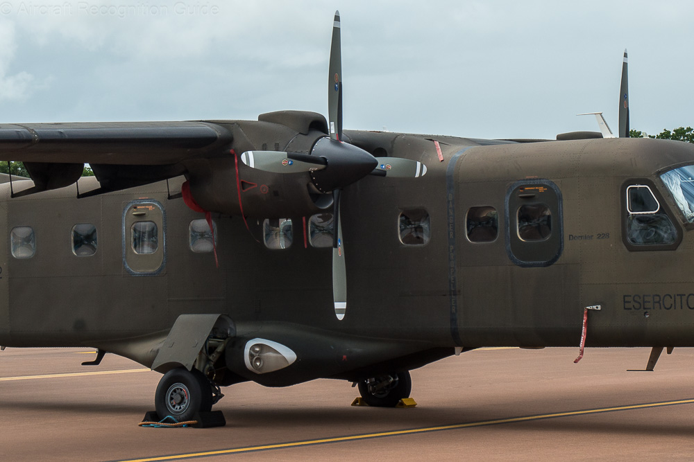 Due to the different colour that the rest of the fuselage, the emergency exits of the Do228-200 series pops out here. Image