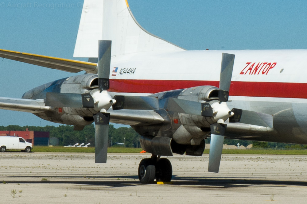 The L-188 Electra has the same engines as the Hercules, but then upside down: the air intakes are above the spinners and the nacelles are largely above the wings. The two wheel main gear retracts in the inner nacelles. Image