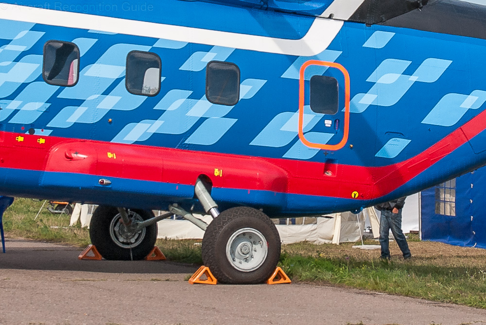 The single wheel main landing gear of the Mi-38 is attached to the lower side of the fuselage with short struts. Image
